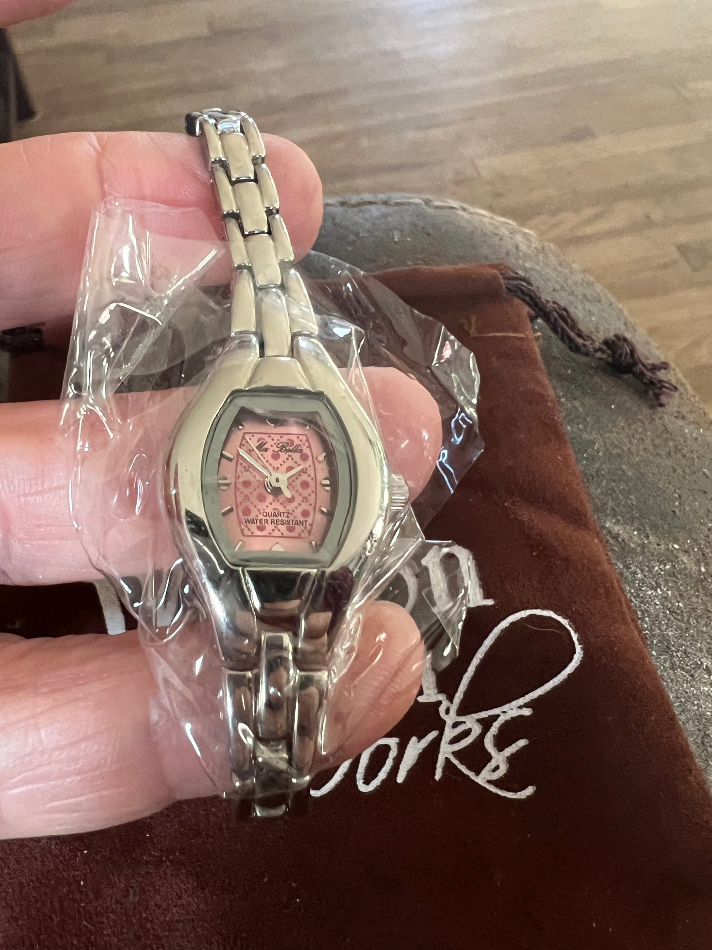 Dainty lady’s Mia Bella silver tone watch hot pink dial