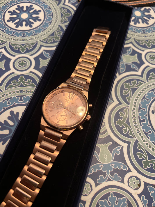 Rose gold tone lady’s Steel by Design Watch